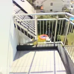 Mit Balkon